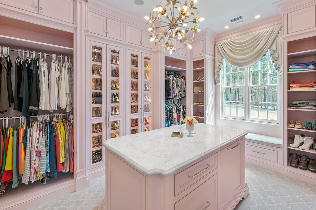 White Carrara marble countertop with fine grey veining in a dressing room